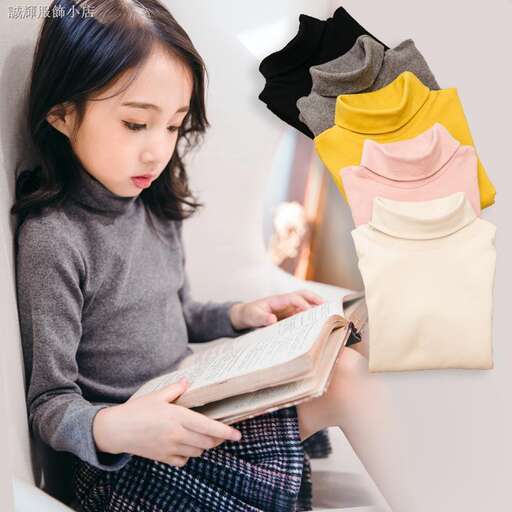 girl reading a book in a train