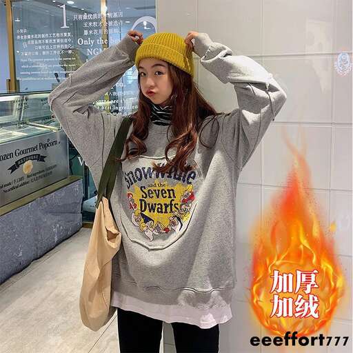 i'm standing in front of a fire in a store window.