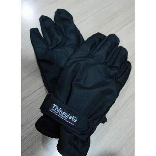 a pair of gloves that are black with white lettering.