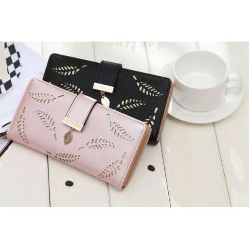 a bag and a cup on a table.