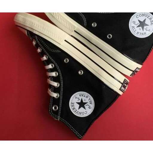 a bag with a few stickers on it.