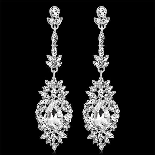 a pair of earrings with diamonds and diamonds