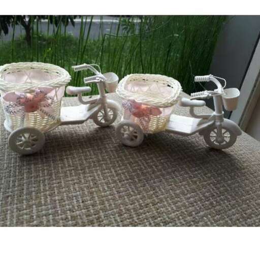 a baby carriage with wheels and wheels.
