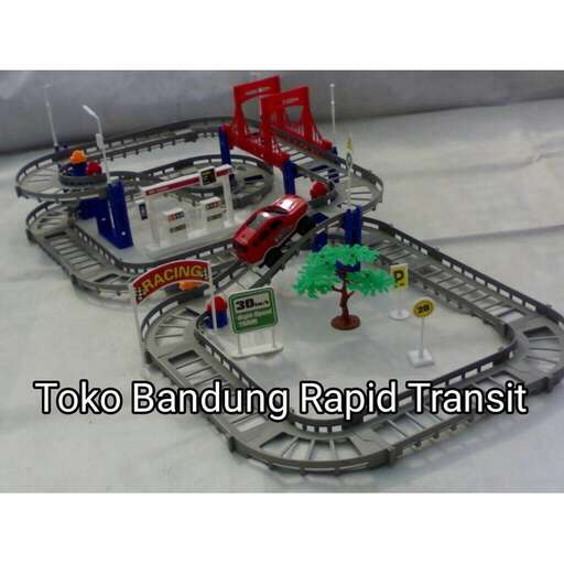 a model of a train set with a train on it.