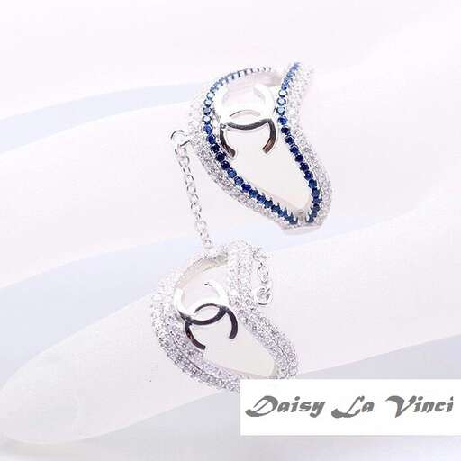 a pair of sterling silver and diamond earrings