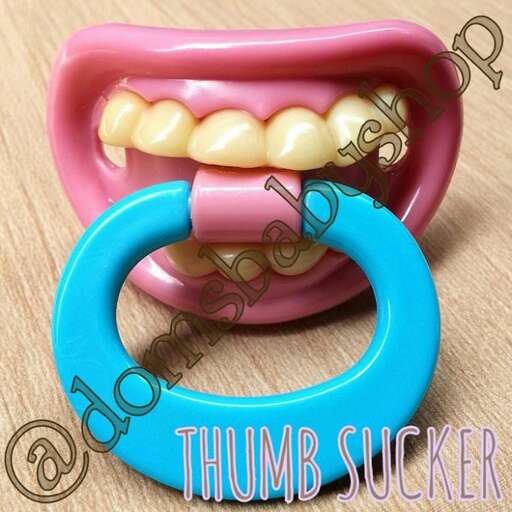a pink and blue ring with a toothbrush in it.