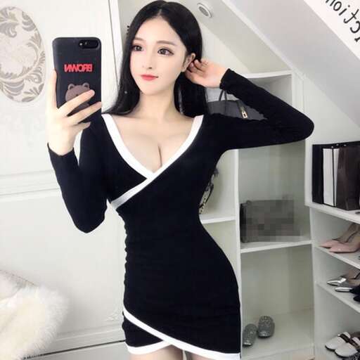 a girl in a black dress with white trim