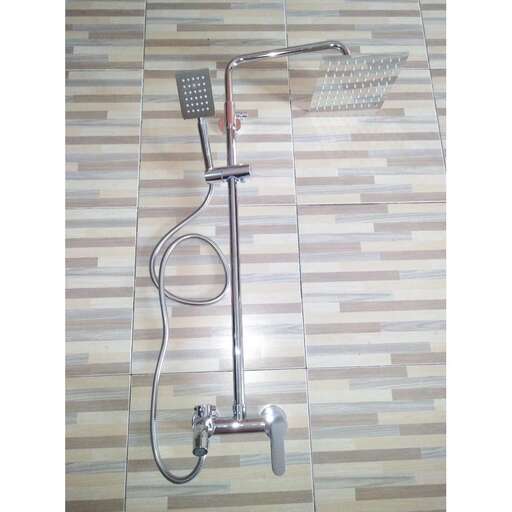 a shower head with a shower head and a metal handle.