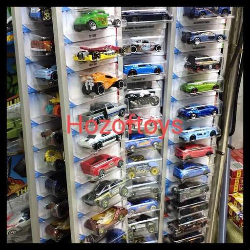 a collection of toy cars in a store