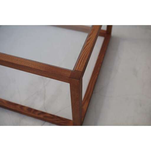 the side table is made from a solid wood frame.