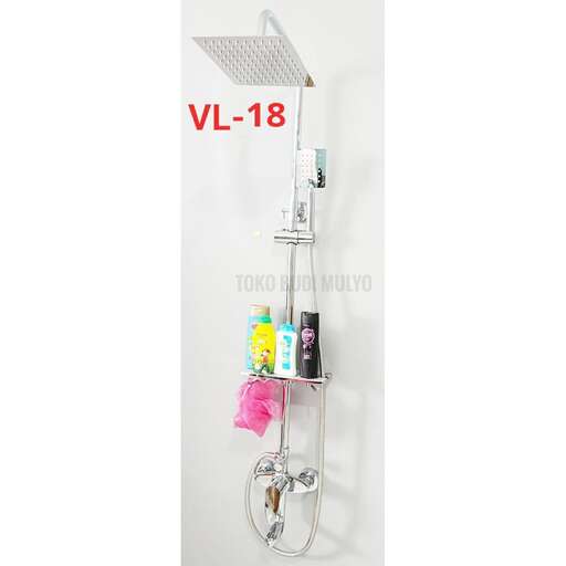 a small shelf with a light and a shelf