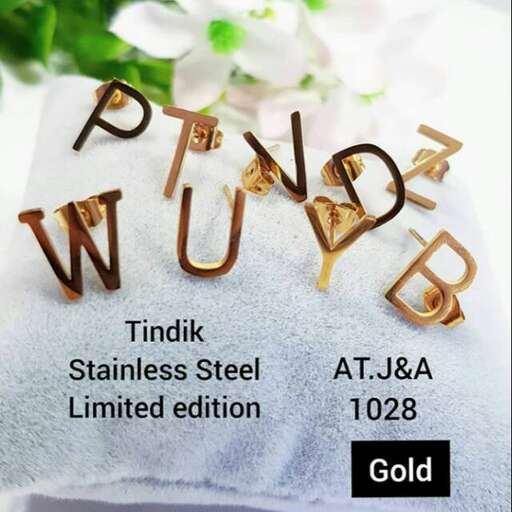 gold letters on the gold plate