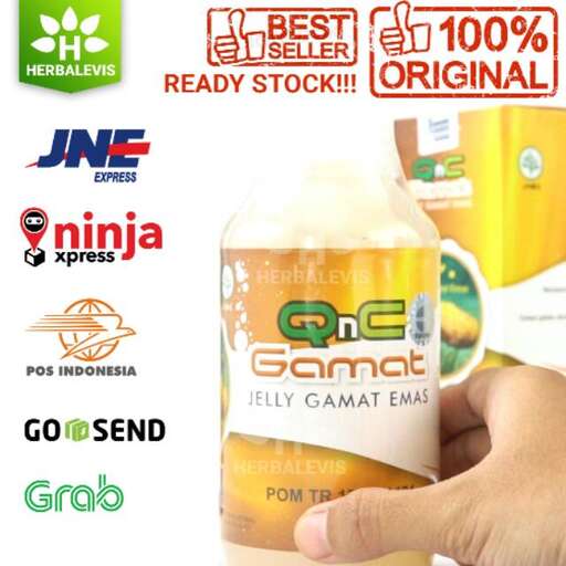 a man holding a bottle of beverage