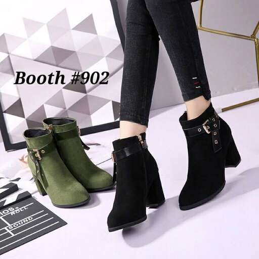 a pair of black boots with a pair of black suede boots.