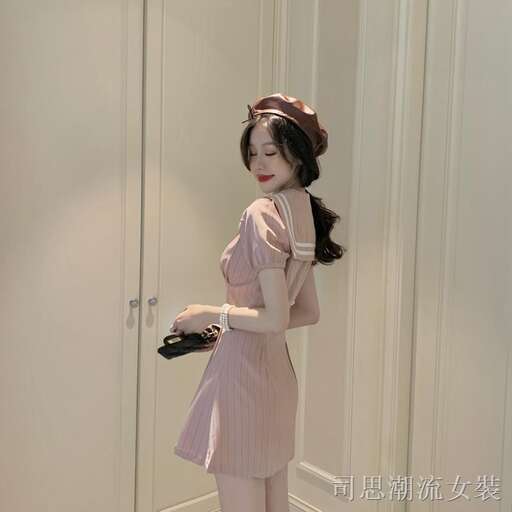 a girl in a dress
