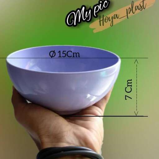 a picture of a bowl with a person holding it.