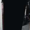 a woman in a black dress
