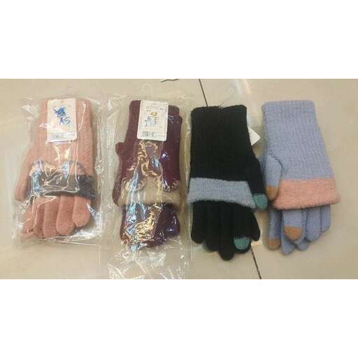 a pair of mitts are on a table.