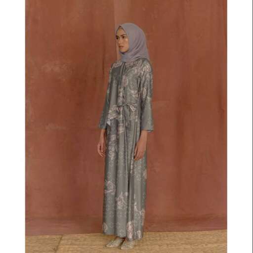 a woman in a grey dress