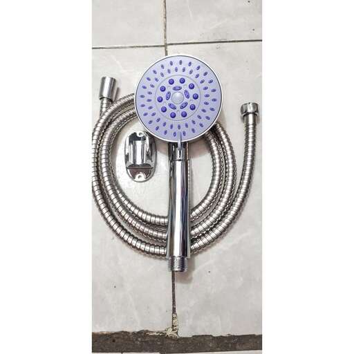 a blue and silver faucet and a blue dish