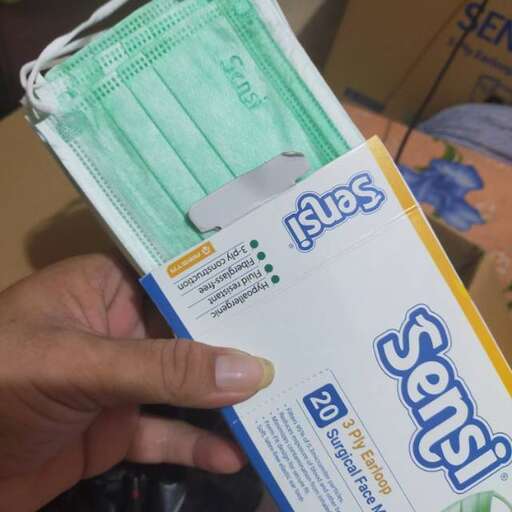 the box is filled with a few packets of tissues.