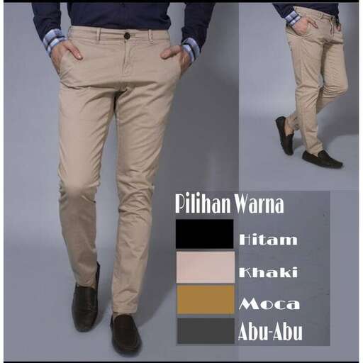 a man in a blue sweater and tan pants.