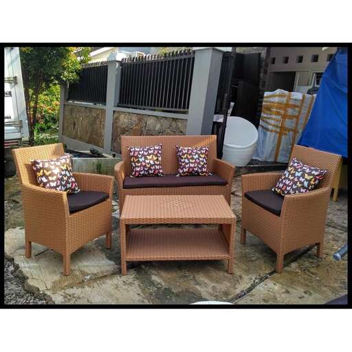 a pair of chairs sitting on a patio.