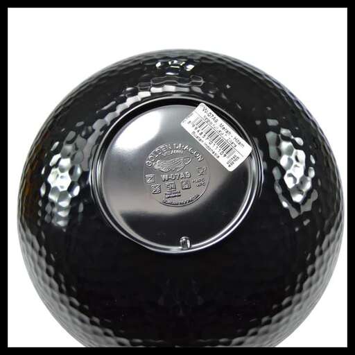 a bowling ball with a label