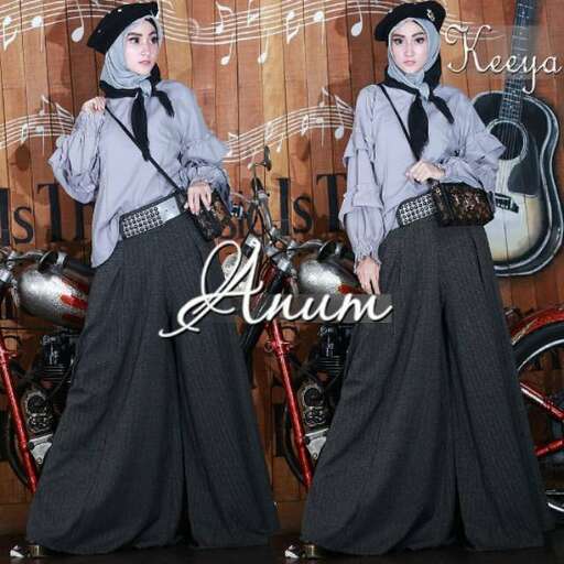 person - - i love the skirt and the hat.