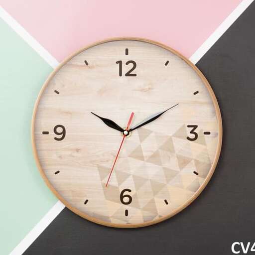 a clock with a geometric pattern