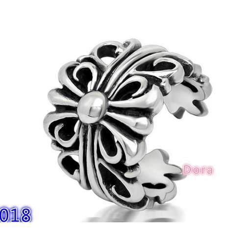 the ring is made of sterling silver and is decorated with a flower.