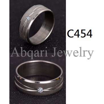 a wedding ring with a diamond ring and a diamond ring.