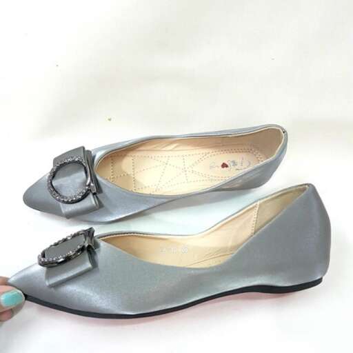 a pair of shoes with a nail polish.