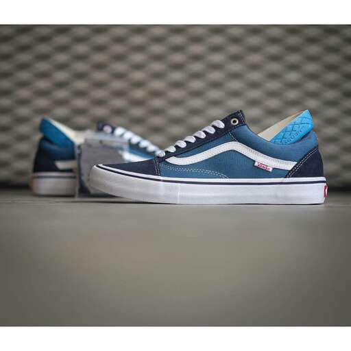 i'm not sure what these shoes are but they are in blue and white.