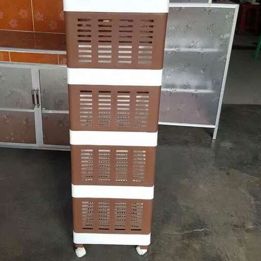 a stack of brown and white boxes with a red brick pattern.