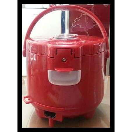 a red toy mixer sitting on a table.