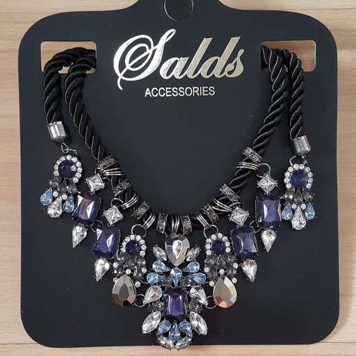 a necklace made of recycled glass and metal.