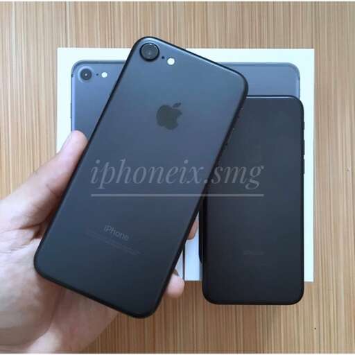 a person holding a smart phone in their hand.