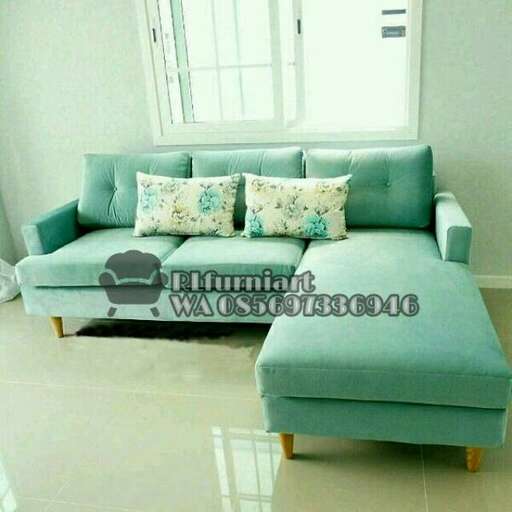 a modern living room with a sofa