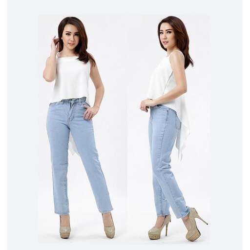 a model in a white top and jeans