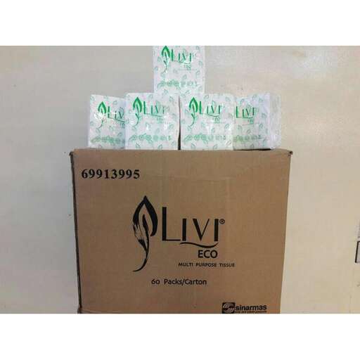 the box with the green and white paper