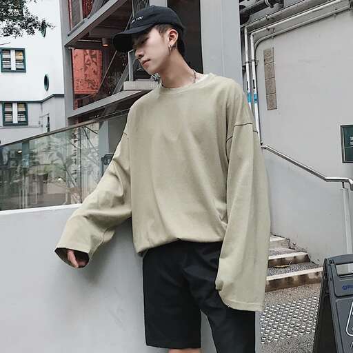 person in a hat and sweater
