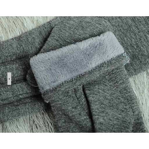 a grey wool coat with a zipper