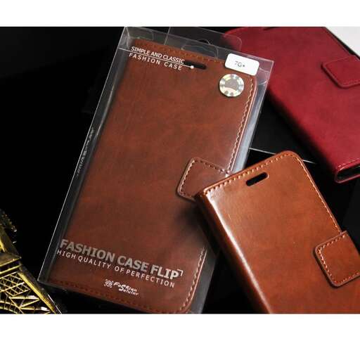 a leather wallet with a gold coin purse on it.