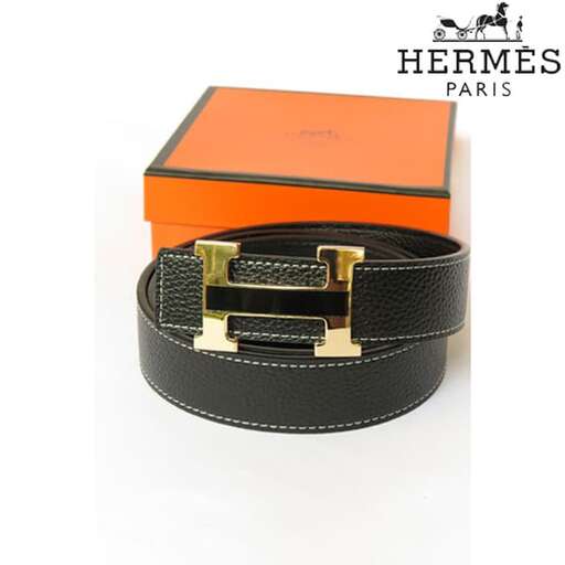 a black leather belt with a gold buckle and a black leather strap.