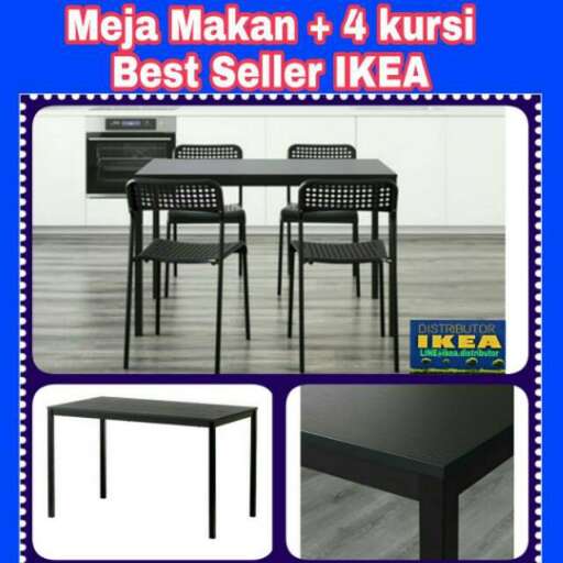a table with a black top and white chairs