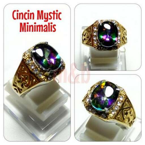 this ring is made of sterling silver, with a green and purple opal set in the center.