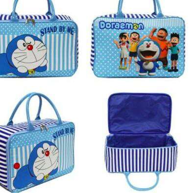 blue and white striped beach bag with a cute little boy in a blue and white striped bag.