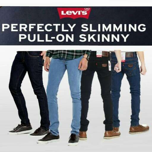 a line of men standing in a room with their legs crossed.