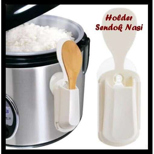 a pot of rice and a spoon in a pot.